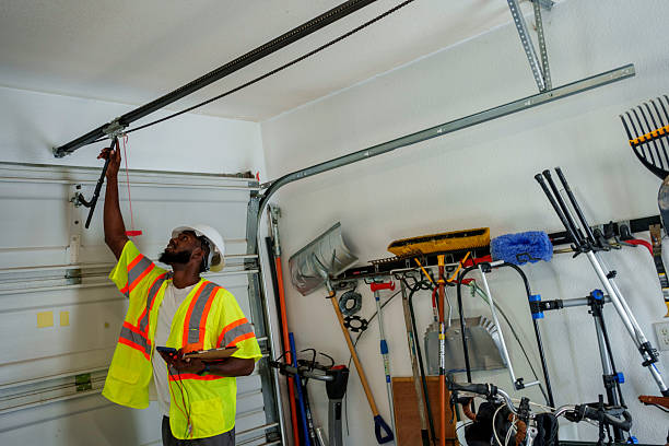 Professional Garage Door Panel Replacement technician working in Emporia city County, VA